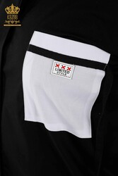 Fabricante detallado de ropa de mujer con bolsillo de camisa con tela de algodón y lycra - 20352 | Textiles reales - Thumbnail